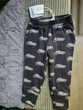 kate quinn black jogger pants with cream motorcycle print